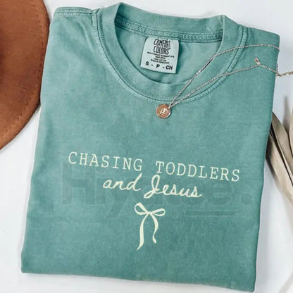 Comfort Colors® Chasing Jesus and Toddlers Coquette T-Shirt