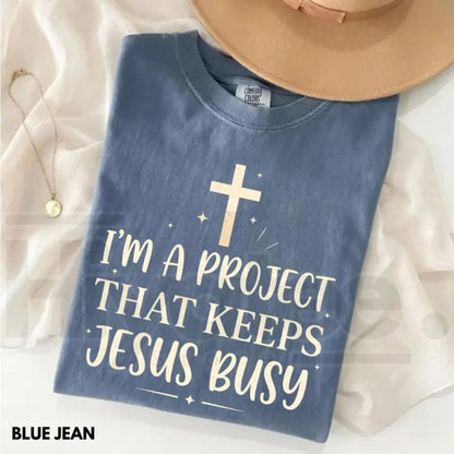 Comfort Colors® I'm A Project That Keeps Jesus Busy Shirt – Funny Christian Faith Tee