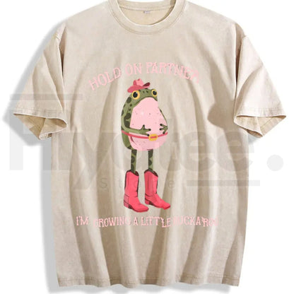 Hold On Partner I'm Growing A Little Buckaroo Vintage Washed T-Shirt – Retro Cowboy Frog Graphic Tee