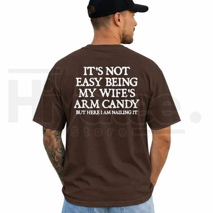 It's Not Easy Being My Wife's Arm Candy T-Shirt – Funny Husband Graphic Tee