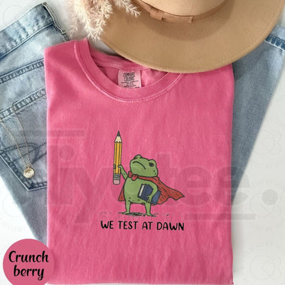Comfort Colors® We Test At Dawn Funny Teacher Frog Shirt – Exam Day Humor Tee