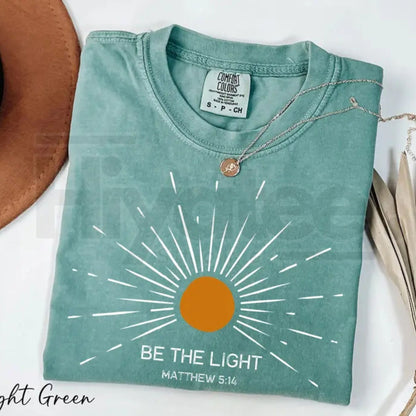 Comfort Colors® Be The Light Shirt – Trendy Bible Verse & Religious Faith Graphic Tee