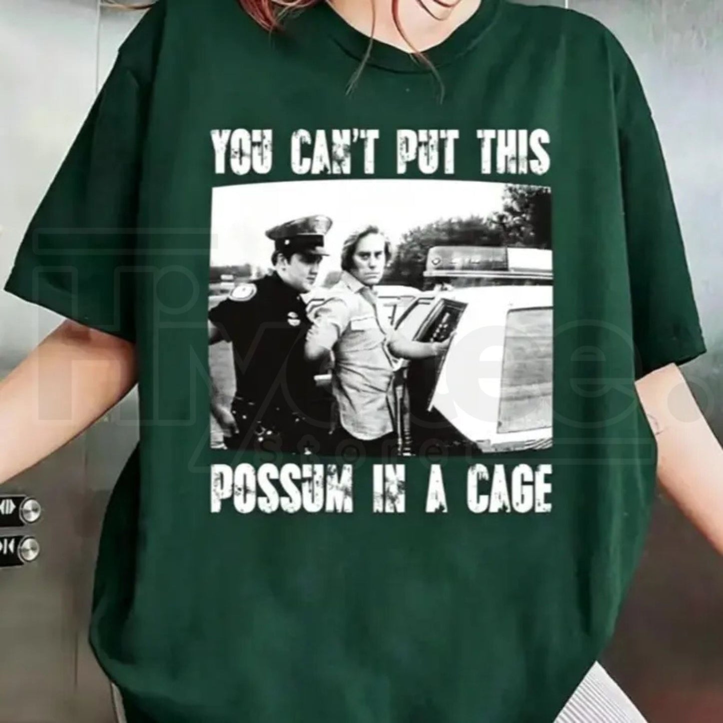 You Can’t Put This Possum In A Cage T-Shirt – Funny George Jones Arrest Graphic Tee