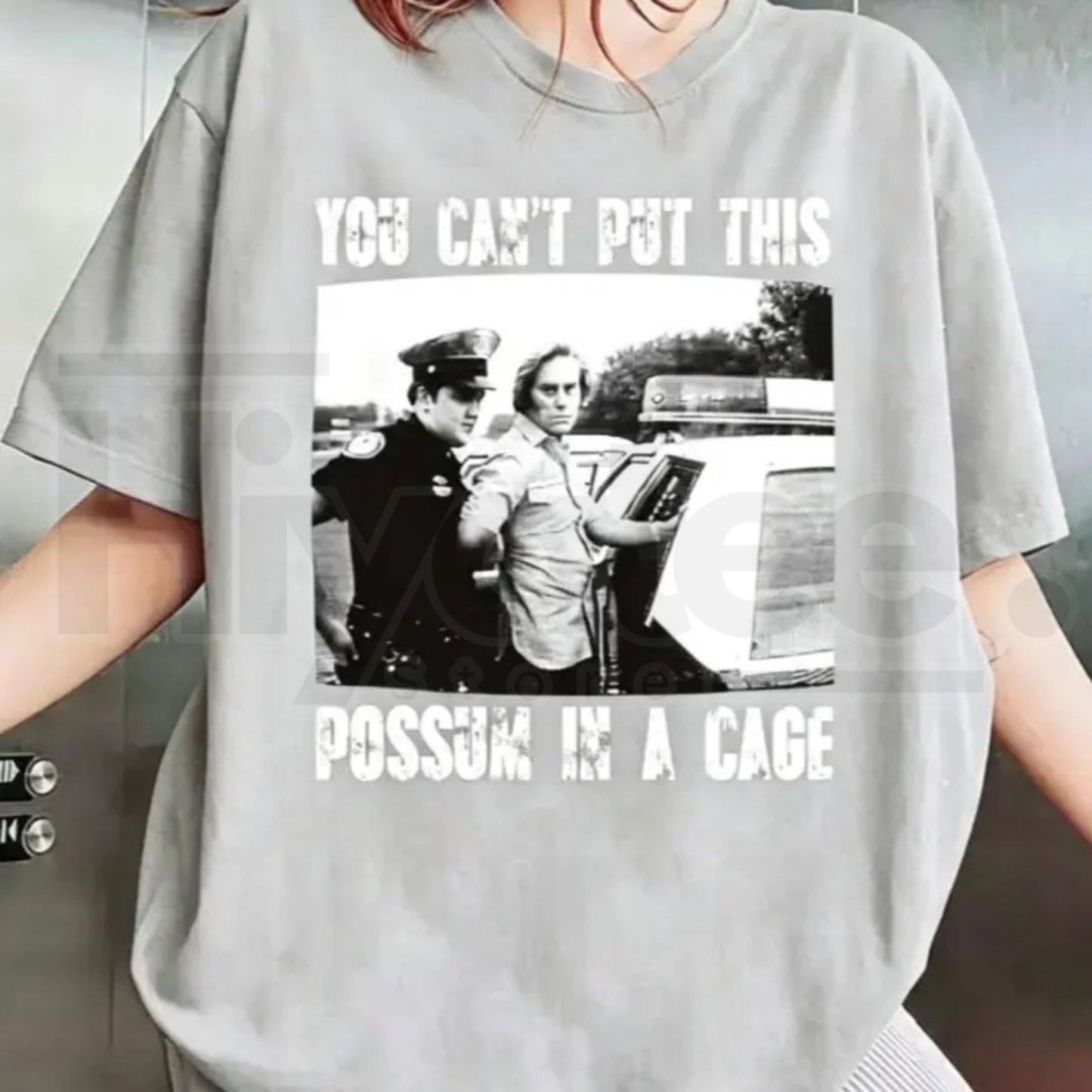 You Can’t Put This Possum In A Cage T-Shirt – Funny George Jones Arrest Graphic Tee