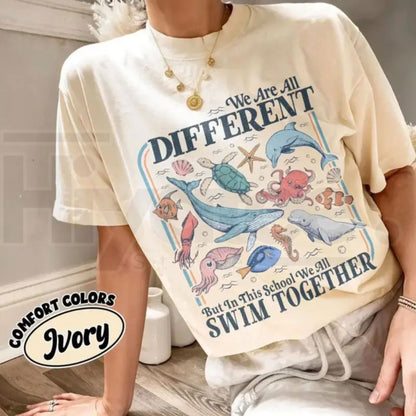 Comfort Colors® We Are All Different But Swim Together Teacher T-Shirt – Inclusive Ocean Animals Graphic Tee, Back To School Educator Gift