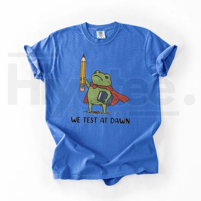 Comfort Colors® We Test At Dawn Funny Teacher Frog Shirt – Exam Day Humor Tee