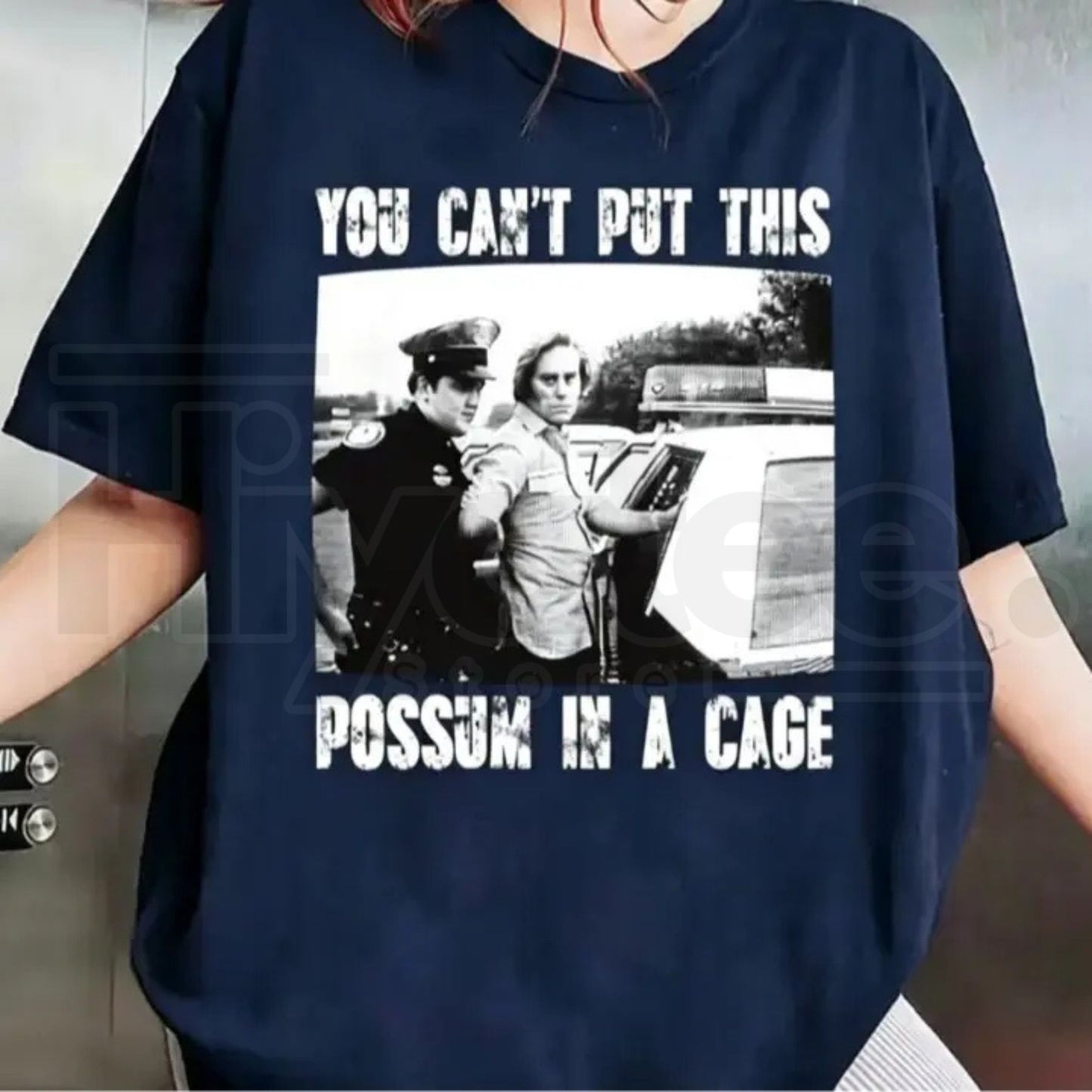 You Can’t Put This Possum In A Cage T-Shirt – Funny George Jones Arrest Graphic Tee