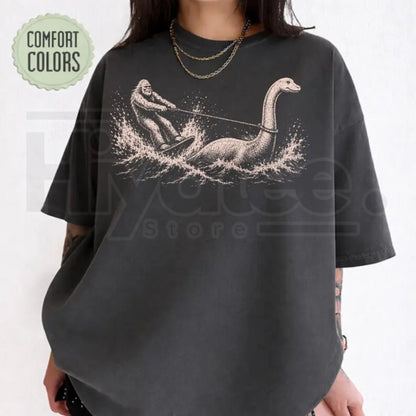 Comfort Colors Funny Bigfoot Loch Ness Monster Waterskiing T-Shirt - Hiyatee