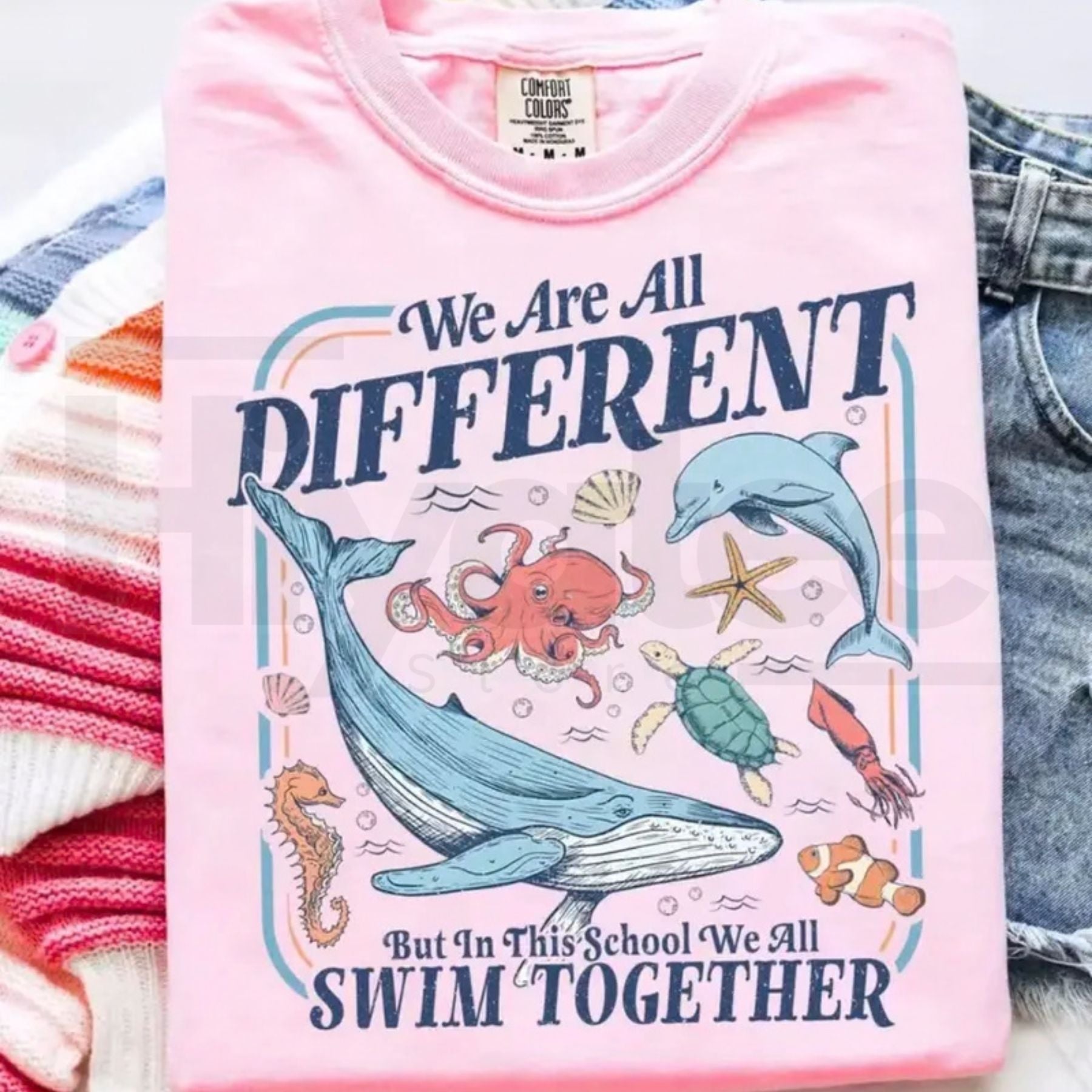 Comfort Colors® We Are All Different But Swim Together Teacher T-Shirt – Inclusive Ocean Animals Graphic Tee, Back To School Educator Gift - Hiyatee