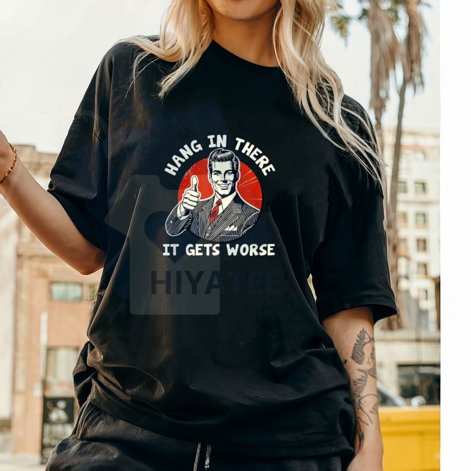 "Hang in There, It Gets Worse" T-Shirt – Humorous Golf Gift Cotton Tee For Men & Women - Hiyatee