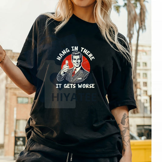 "Hang in There, It Gets Worse" T-Shirt – Humorous Golf Gift Cotton Tee For Men & Women - Hiyatee