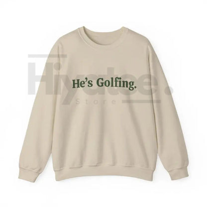 He’s Golfing Sweatshirt | Funny Golf Widow Crewneck-Hiyatee