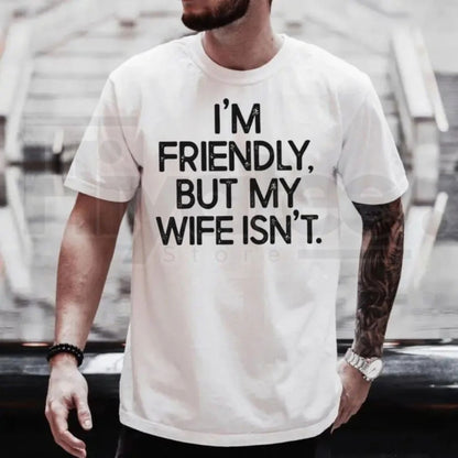 "I'm Friendly But My Wife Isn't" Funny Warning T-Shirt – Marriage Humor Gift - Hiyatee