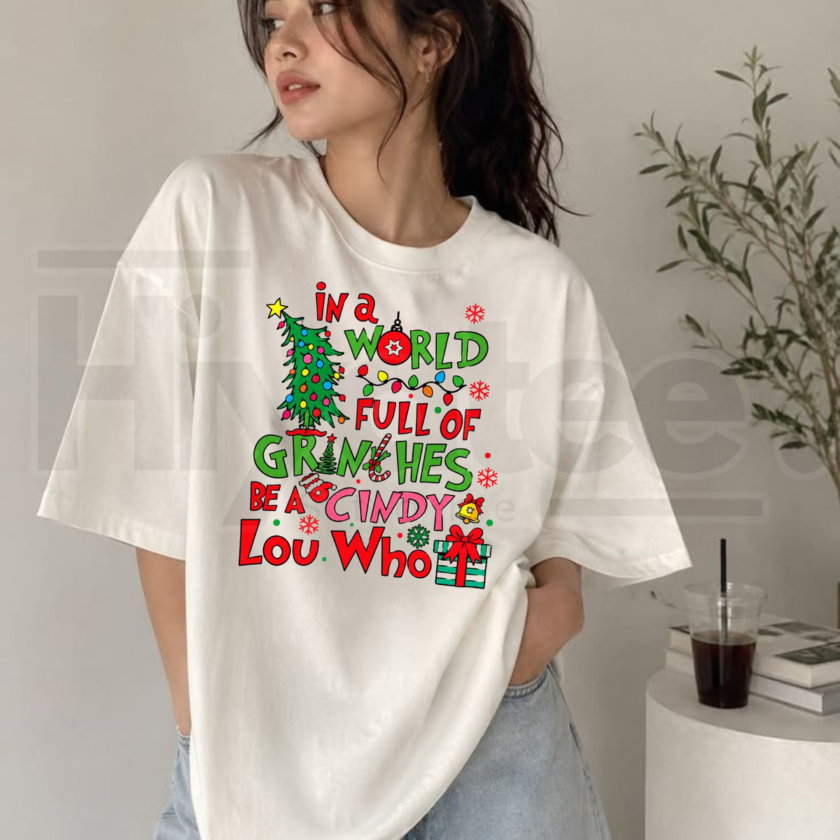 In a World Full of Grinches Be a Cindy Lou Who T-Shirt – Inspirational Christmas Holiday Graphic Tee - Hiyatee