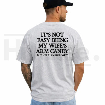 It's Not Easy Being My Wife's Arm Candy T-Shirt – Funny Husband Graphic Tee - Hiyatee