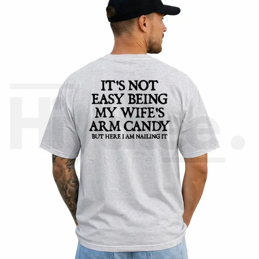 It's Not Easy Being My Wife's Arm Candy T-Shirt – Funny Husband Graphic Tee - Hiyatee