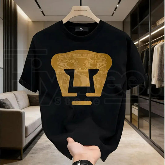 LIGA MX PUMAS UNAM T-Shirt – High-Quality Gold Emblem Football Club Crewneck, Menswear Graphic Tee.. - Hiyatee