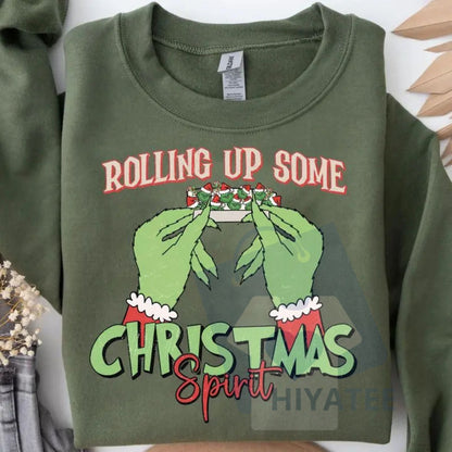 "Rolling Up Some Christmas Spirit" Sweatshirt – Funny Holiday Graphic Sweatshirt, Smoking Christmas Slogan Pullover, Edgy Xmas Gift - Hiyatee