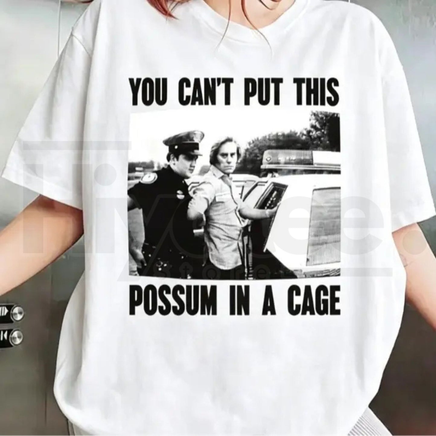 You Can’t Put This Possum In A Cage T-Shirt – Funny George Jones Arrest Graphic Tee - Hiyatee